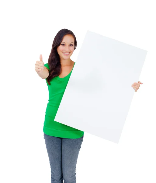 Beautiful caucasian woman holding a blank sign — Stockfoto