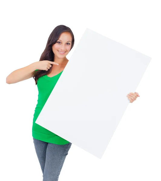 Beautiful caucasian woman holding a blank sign — Stockfoto