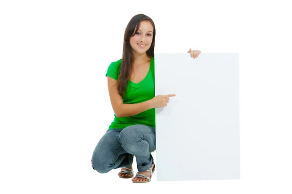Beautiful caucasian woman holding a blank sign — Stock Fotó