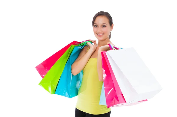 Impresionante mujer joven llevando bolsas de compras — Foto de Stock