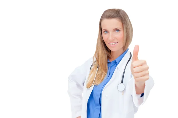 Mujer doctora de uniforme mostrando un signo de éxito, después de un éxito —  Fotos de Stock