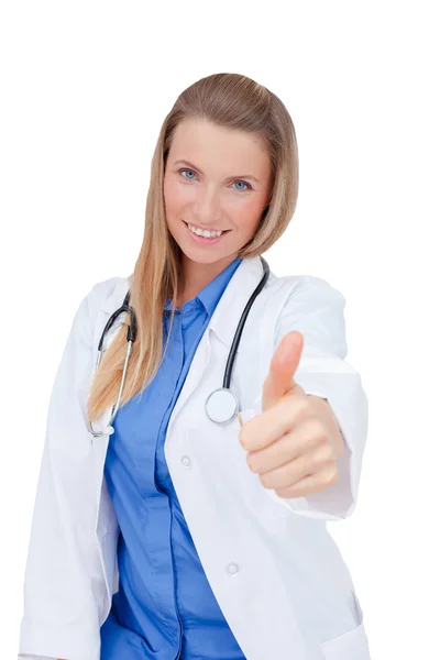 Mujer doctora de uniforme mostrando un signo de éxito, después de un éxito —  Fotos de Stock