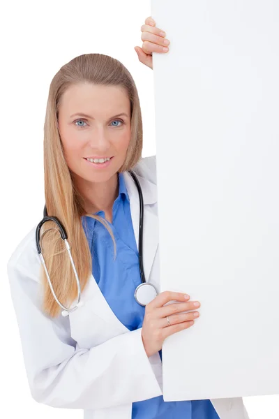 Enfermeira / médico mostrando sinal de área de transferência em branco . — Fotografia de Stock