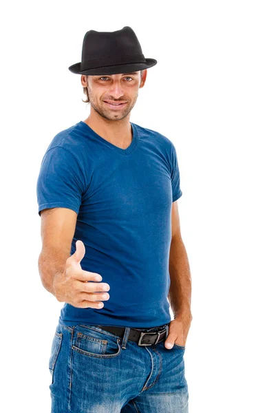 Молодой улыбающийся мужчина готов к рукопожатию — стоковое фото