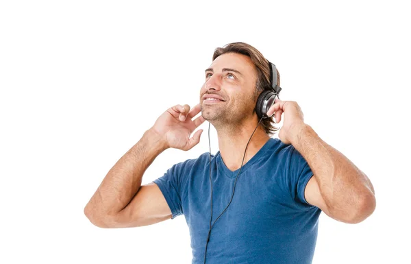 Joven escuchando música — Foto de Stock