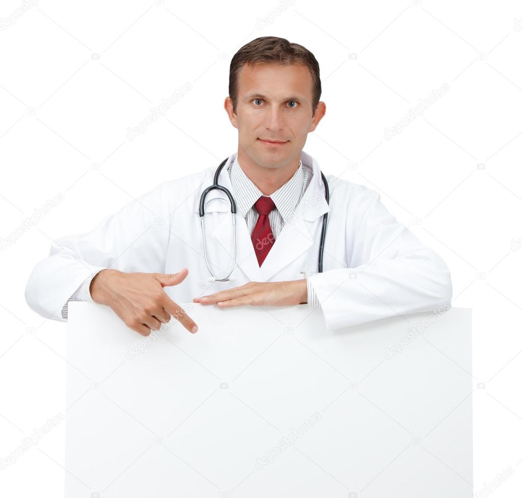 Happy doctor showing blank clipboard sign.