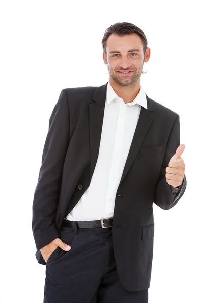 Joven feliz hombre de negocios mostrando pulgares hacia arriba signo . — Foto de Stock