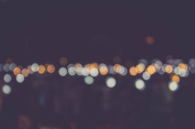 Retro filtredeki araba ışığının soyut bokeh 'i