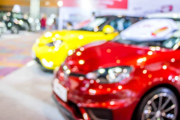 Verschwommenes Rotes Und Gelbes Auto Auf Automesse Oder Automesse — Stockfoto