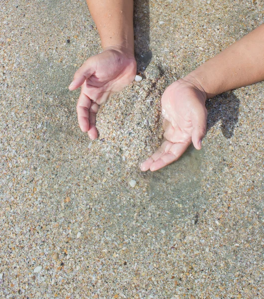 Areia na mão — Fotografia de Stock