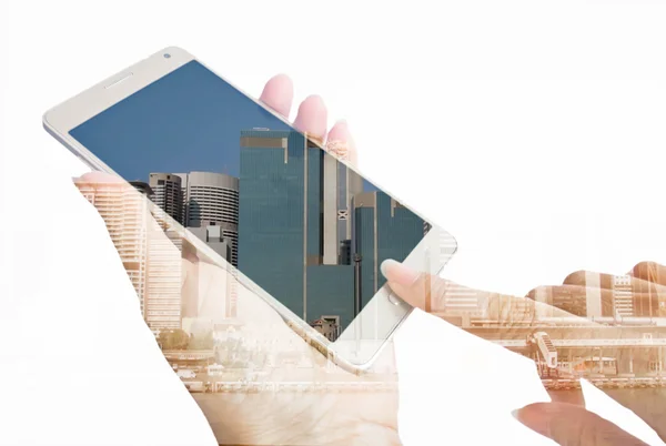 Double exposure photo of hand and the modern building — Stock Photo, Image
