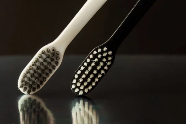 Close Black White Toothbrushes Black Background Oral Hygiene Concept — Stock Photo, Image