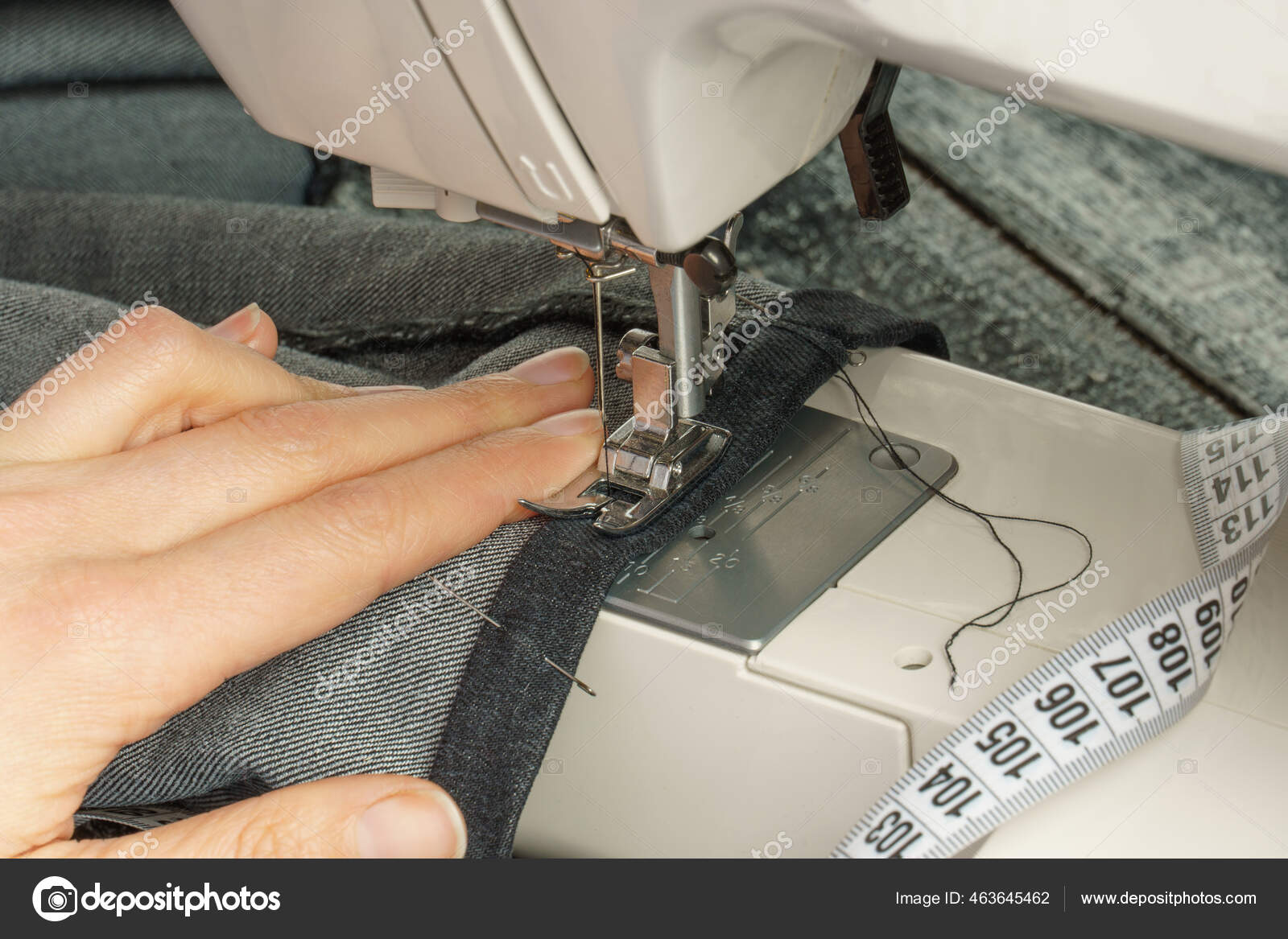 Process Shortening Jeans Pants Sewing Machine Stock Photo by ©Nikvart