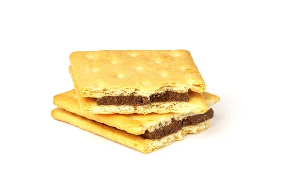 在白色背景上分离的饼干饼干 两半块带有巧克力层的饼干 — 图库照片
