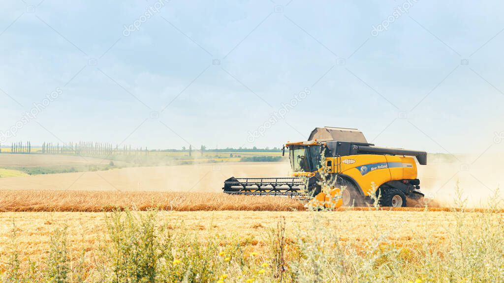 Novoukrainka, Ukraine, July 30, 2021-combine harvester harvesting a wheat field. Agriculture