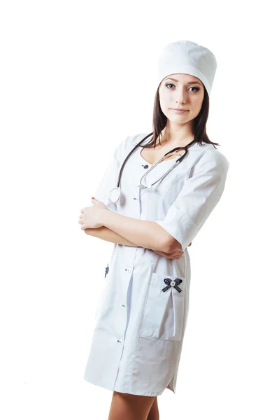 Lächelnde Ärztin mit Stethoskop. Isoliert über weißem Hintergrund — Stockfoto