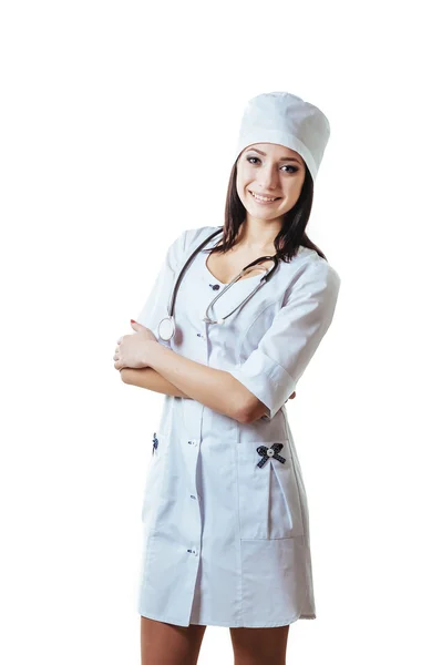 Lächelnde Ärztin mit Stethoskop. Isoliert über weißem Hintergrund — Stockfoto