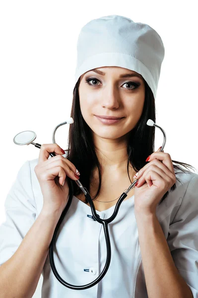 Beyaz arka plan üzerinde izole kadın doktor stetoskop, ayakta ile. — Stok fotoğraf