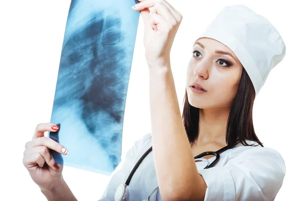 Female doctor looking at an x-ray,isolated on white background — Stock Photo, Image