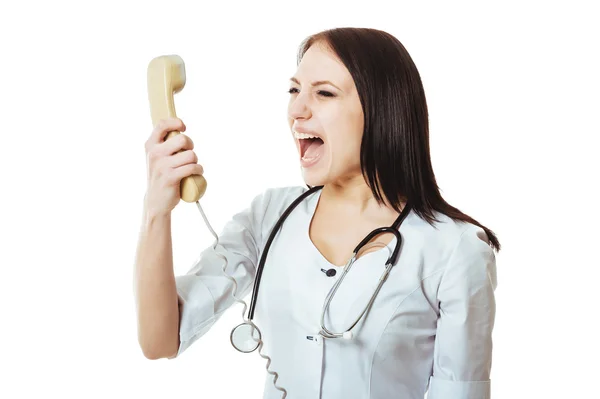 Woman doctor feeling sad on the phone because of bad news — Stock Photo, Image