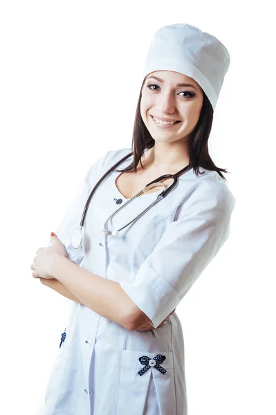 Médico sonriente mujer con estetoscopio. Aislado sobre fondo blanco Imágenes de stock libres de derechos