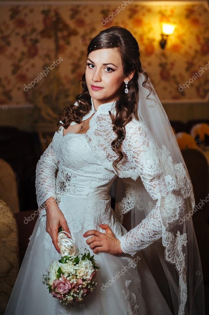 Gorgeous Bride Blonde In Wedding Dress On Luxury Interior With