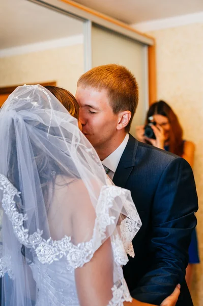 Handsome groom first time meets his bride at her house on a wedding day. — Stock Photo, Image