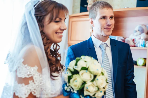 Handsome groom first time meets his bride at her house on a wedding day. — Stock Photo, Image