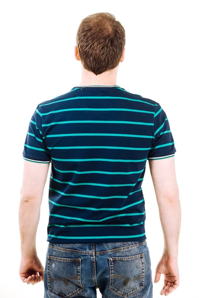 Jonge man met groene polo shirt op een witte achtergrond — Stockfoto