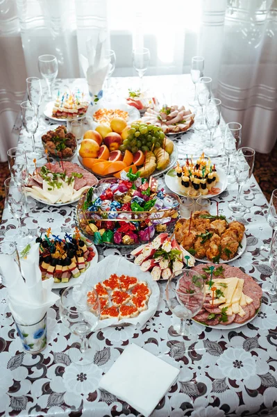 Table with food and drink. traditional wedding banquet. — Stock Photo, Image