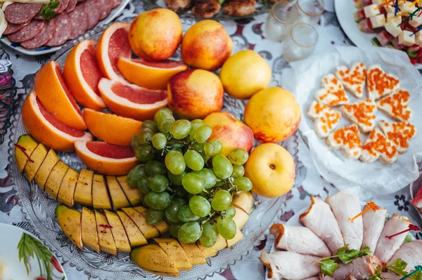 Table with food and drink. traditional wedding banquet. — Stock Photo, Image