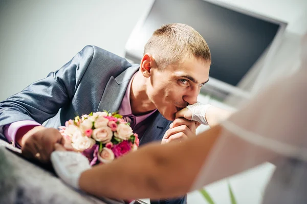 Charming bride and groom on their wedding celebration in a luxurious restaurant. Loving couple on date — Stock Photo, Image