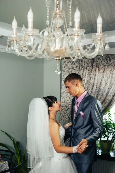 Charming bride and groom on their wedding celebration in a luxurious restaurant. Loving couple on date — Stock Photo, Image