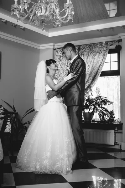 Charming bride and groom on their wedding celebration in a luxurious restaurant. Loving couple on date — Stock Photo, Image