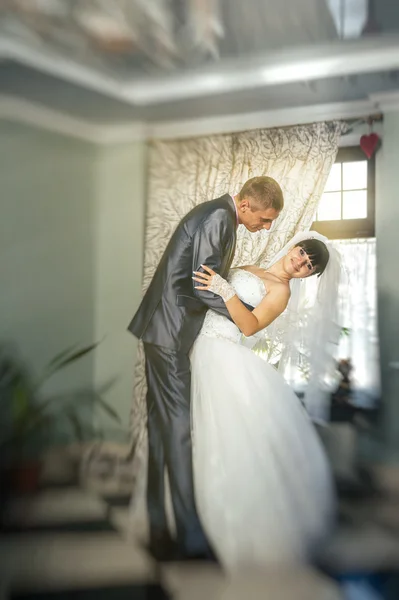 Charming bride and groom on their wedding celebration in a luxurious restaurant. Loving couple on date — Stock Photo, Image