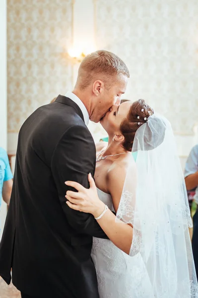 beautiful caucasian couple just married and dancing their first dance