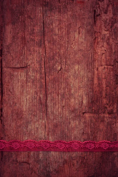 Czerwone Wstążki Tle Drewniany Stół — Zdjęcie stockowe