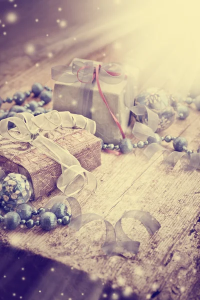 Gift boxes with Christmas decorations — Stock Photo, Image