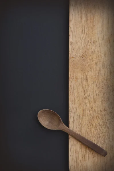 Old Wooden cutting board and spoon — Stock Photo, Image