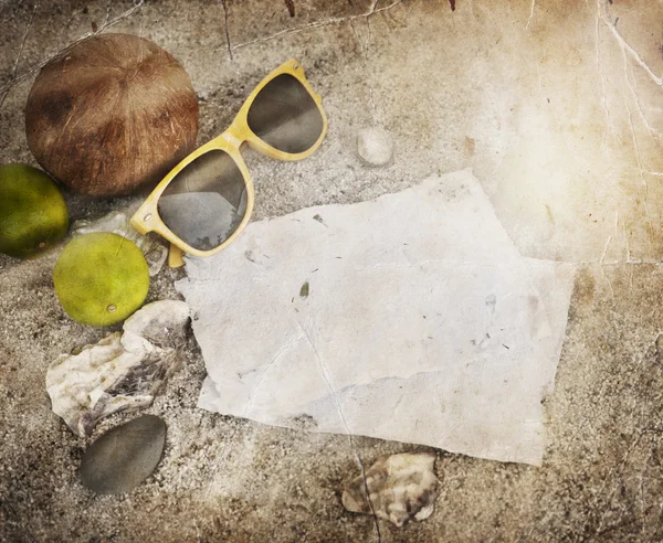 Papers, limes, coconut and sunglasses — Stock Photo, Image