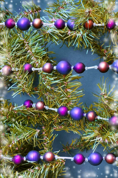 Christmas decorations on fir tree — Stock Photo, Image