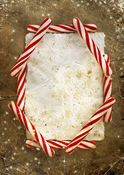 Christmas candy canes with card — Stock Photo, Image