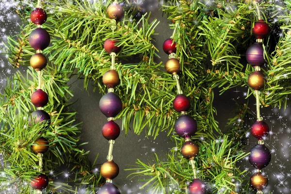 Christmas decorations on fir tree — Stock Photo, Image