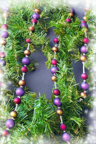 Christmas decorations on fir tree — Stock Photo, Image