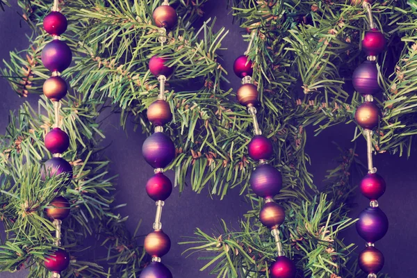 Christmas decorations on fir tree — Stock Photo, Image