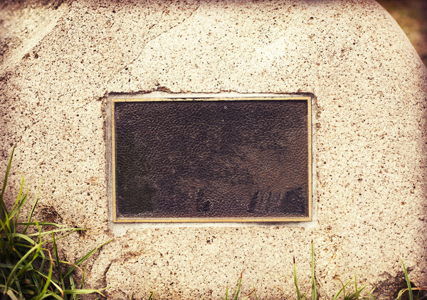 Plaque embedded in wall stone