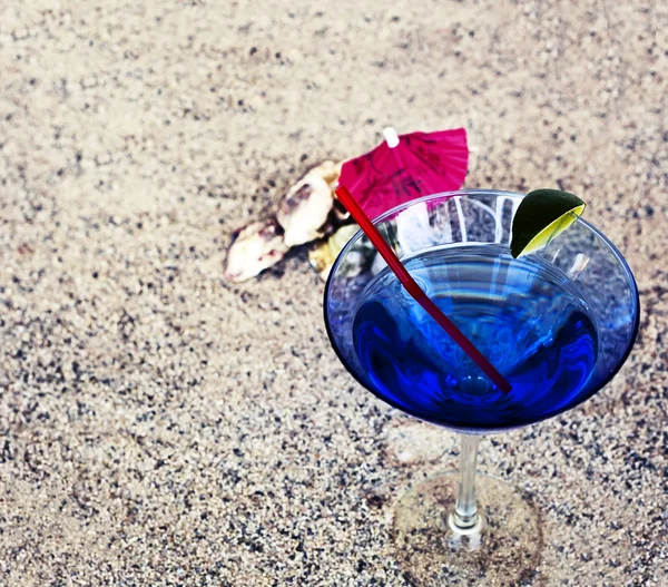 Cocktail glass with umbrella — Stock Photo, Image