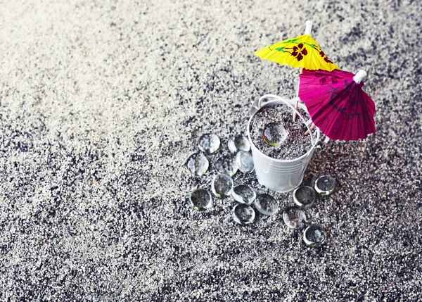 Little white bucket full of sand — Stock Photo, Image