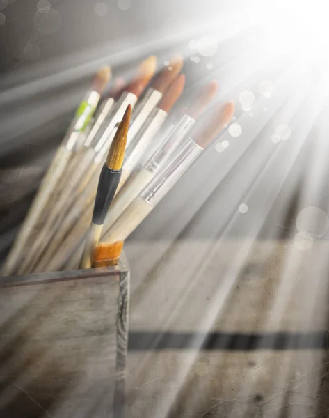 Brushes in wooden box — Stock Photo, Image