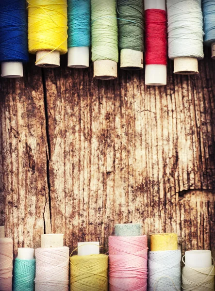 Bobbins with colorful threads — Stock Photo, Image